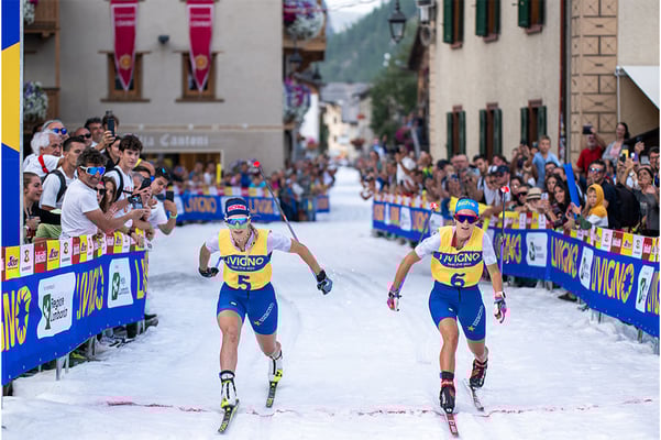 1k SHOT: INSONNI AND GABRIELLI TRIUMPH AMONG TWO WINGS OF CROWD.